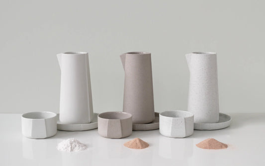 Two circular tableware sets made with recycled ceramic waste